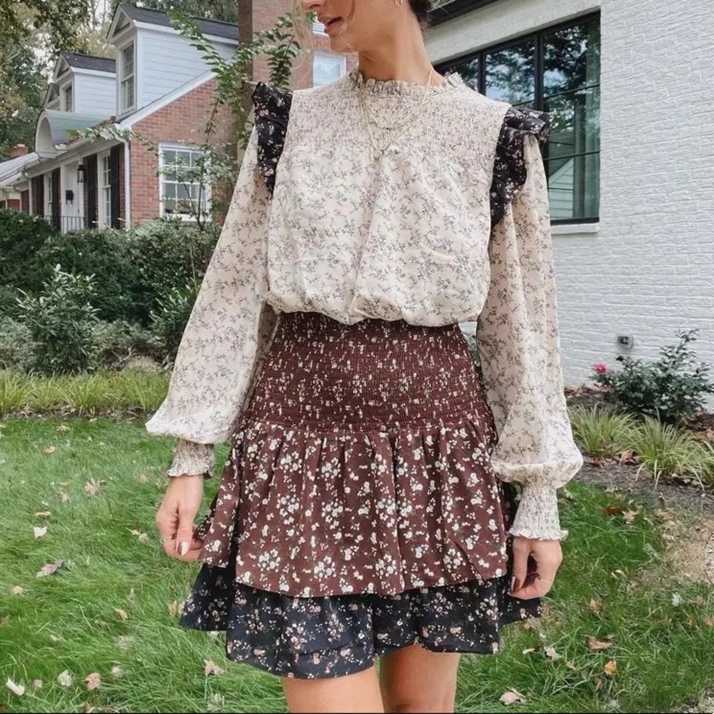 Dainty dress, fitted waist with blousy top and skirt. Perfect for fall!